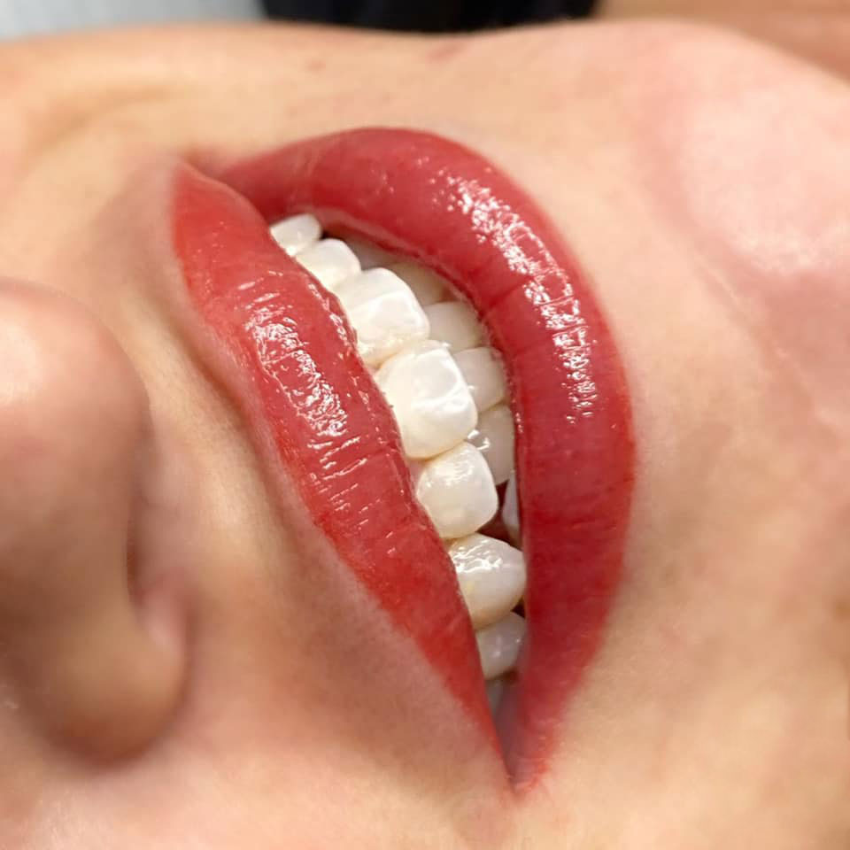 Full lipstick permanent makeup at Rebel Aesthetics in New Jersey creating bold, defined lips.